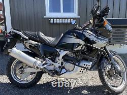 This title translates to: 'This Grand Comfort seat compatible with HONDA AFRICA TWIN XRV 750 1993-2002 SGC1052 Gel'